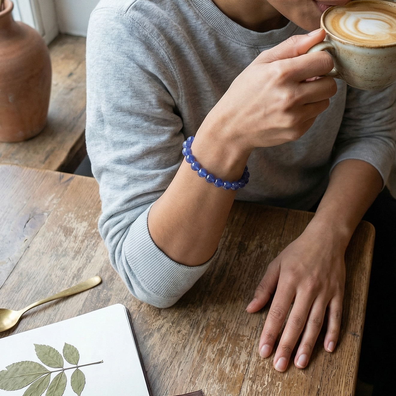 tanzanite bracelet catches soft daylight.