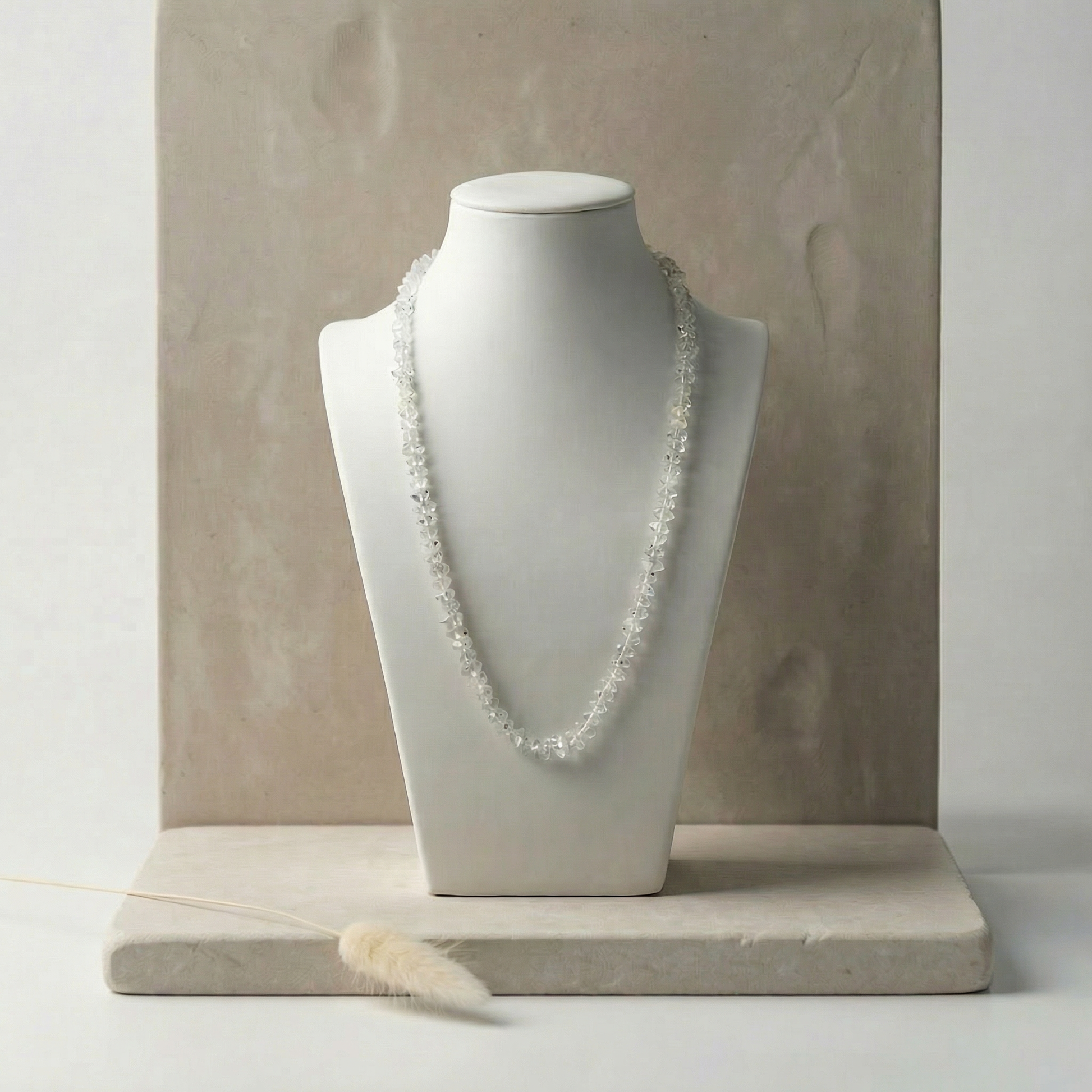 Delicate 17" extra-small mixed-clarity quartz chip necklace draped on a matte bust, soft top-front light catching tiny sparkles and subtle micro-shadows.